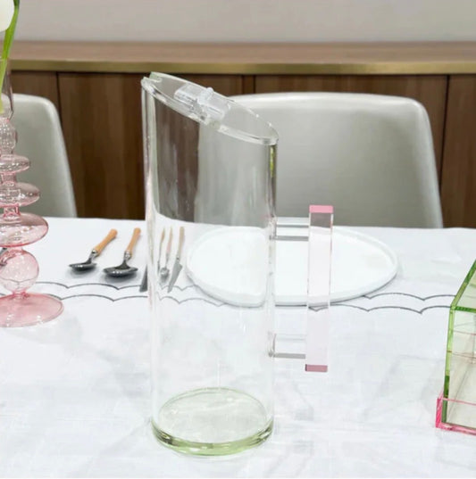 Pink tint lucite pitcher with green handle